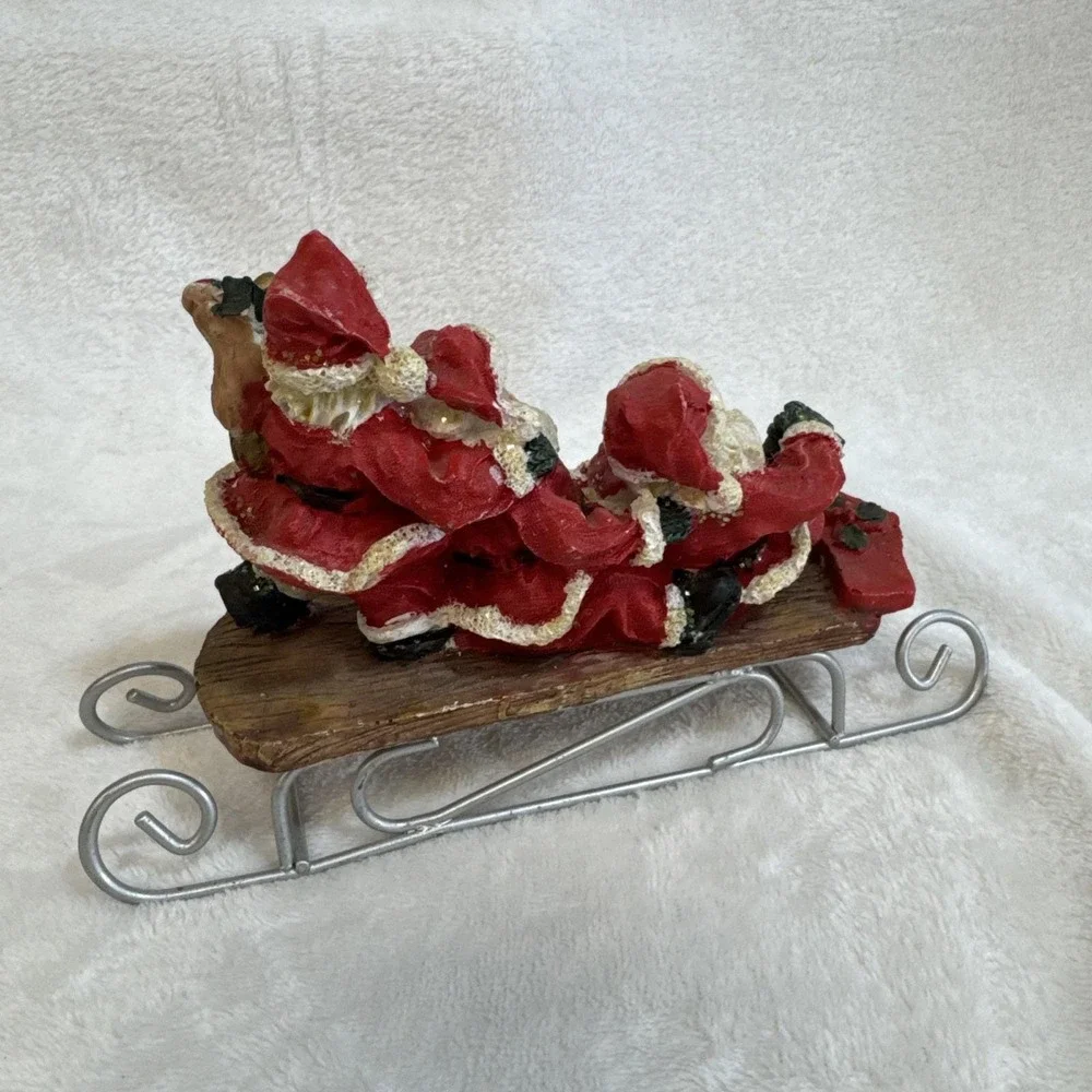 Three Jolly Santas‎ Riding On a Sled Christmas Figurine Vintage 90s